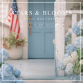 Patriotic porch with blue door, American flag, and hydrangeas for photography backdrop