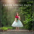 Digital background of a sunlit garden path surrounded by vibrant green spring foliage, ideal for dreamy photo composites and portrait editing.